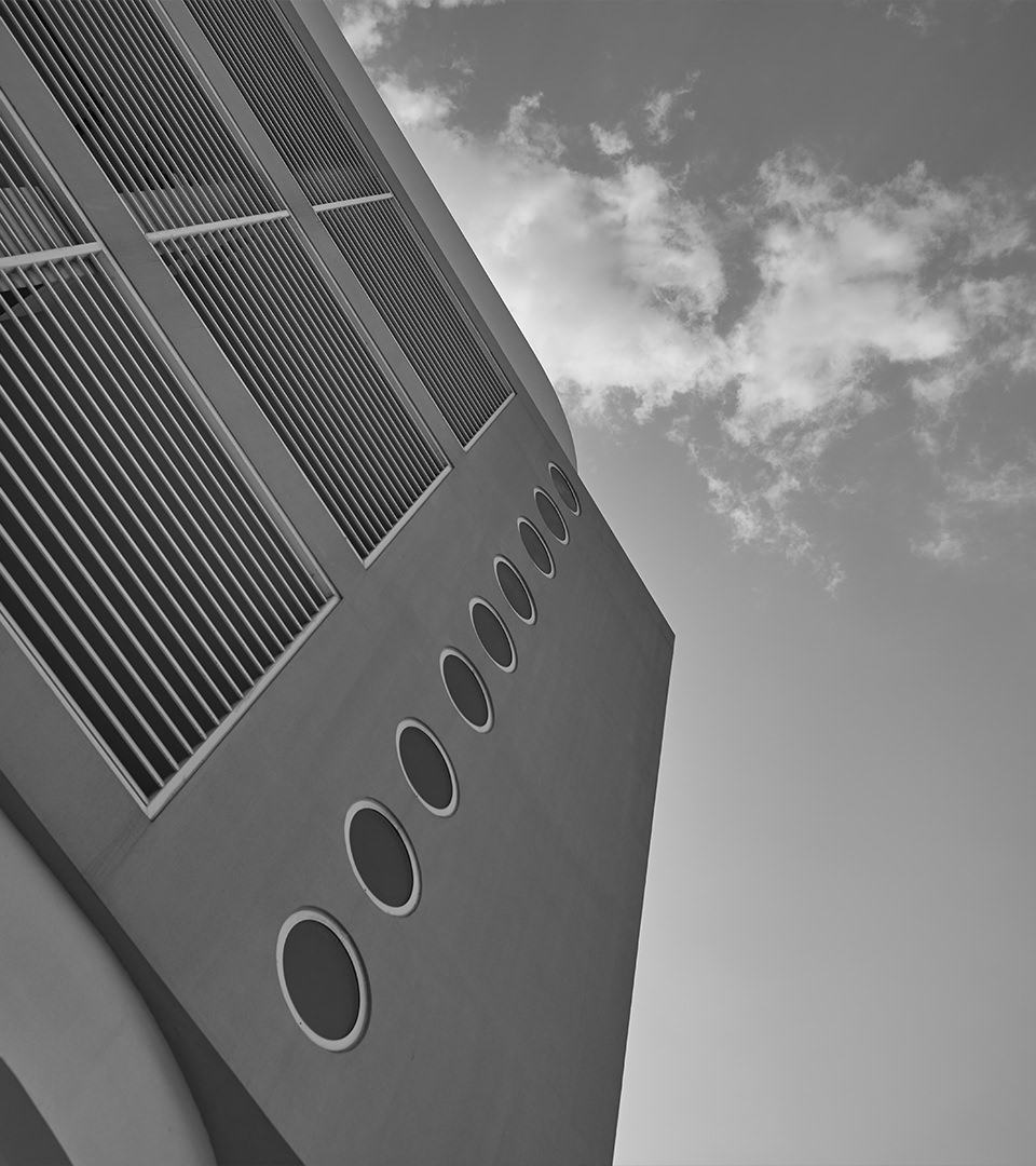 A black and white photo of the Lot 172 Parking Lots building.